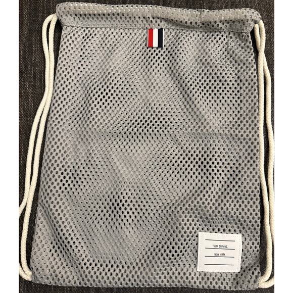 Brand New Thom Browne Mesh Gym Bag / Drawstring Backpack, Gray
. Yours for? - Picture 1 of 3